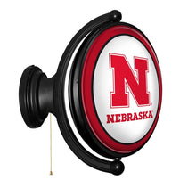 Load image into Gallery viewer, Nebraska Cornhuskers: Huskers - Original Oval Rotating Lighted Wall Sign - The Fan-Brand