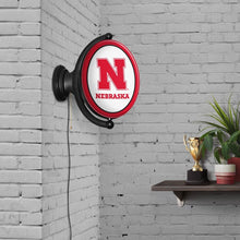 Load image into Gallery viewer, Nebraska Cornhuskers: Huskers - Original Oval Rotating Lighted Wall Sign - The Fan-Brand