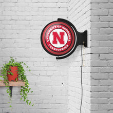 Load image into Gallery viewer, Nebraska Cornhuskers: Original Round Rotating Lighted Wall Sign - The Fan-Brand