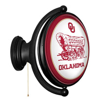 Load image into Gallery viewer, Oklahoma Sooners: Double Sided Original Oval Rotating Lighted Wall Sign - The Fan-Brand