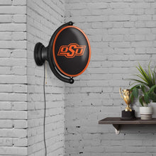 Load image into Gallery viewer, Oklahoma State Cowboys: Original Oval Rotating Lighted Wall Sign - The Fan-Brand
