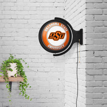 Load image into Gallery viewer, Oklahoma State Cowboys: Original Round Rotating Lighted Wall Sign - The Fan-Brand