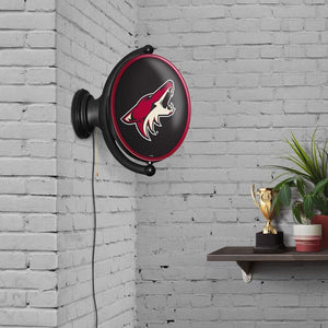 Arizona Coyotes: Original Oval Rotating Lighted Wall Sign - The Fan-Brand