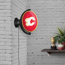 Load image into Gallery viewer, Calgary Flames: Original Oval Rotating Lighted Wall Sign - The Fan-Brand