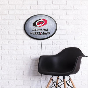 Carolina Hurricanes: Ice Rink - Oval Slimline Lighted Wall Sign - The Fan-Brand