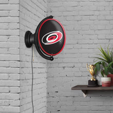 Load image into Gallery viewer, Carolina Hurricanes: Original Oval Rotating Lighted Wall Sign - The Fan-Brand