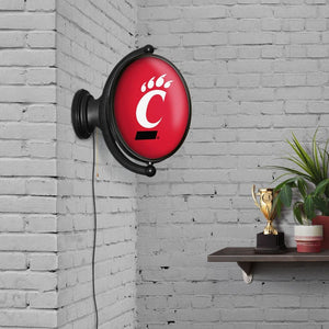 Cincinnati Bearcats: Original Oval Rotating Lighted Wall Sign - The Fan-Brand