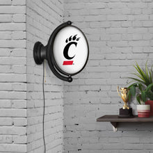 Load image into Gallery viewer, Cincinnati Bearcats: Original Oval Rotating Lighted Wall Sign - The Fan-Brand