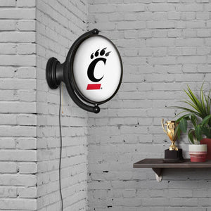 Cincinnati Bearcats: Original Oval Rotating Lighted Wall Sign - The Fan-Brand