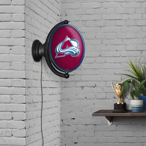 Colorado Avalanche: Original Oval Rotating Lighted Wall Sign - The Fan-Brand