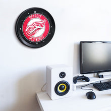 Load image into Gallery viewer, Detroit Red Wings: Ribbed Frame Wall Clock - The Fan-Brand
