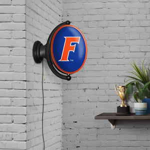 Florida Gators: F - Original Oval Rotating Lighted Wall Sign - The Fan-Brand