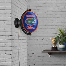 Load image into Gallery viewer, Florida Gators: Original Oval Rotating Lighted Wall Sign - The Fan-Brand