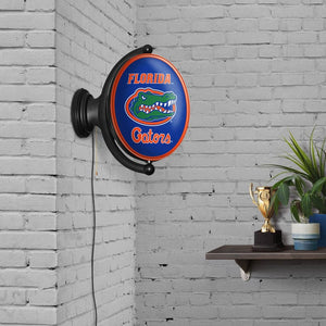 Florida Gators: Original Oval Rotating Lighted Wall Sign - The Fan-Brand