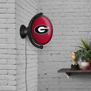 Georgia Bulldogs: Original Oval Rotating Lighted Wall Sign - The Fan-Brand