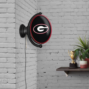 Georgia Bulldogs: Original Oval Rotating Lighted Wall Sign - The Fan-Brand