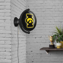 Load image into Gallery viewer, Iowa Hawkeyes: Original Oval Rotating Lighted Wall Sign - The Fan-Brand