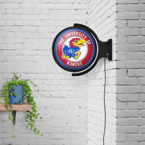 Kansas Jayhawks: Original Round Rotating Lighted Wall Sign - The Fan-Brand