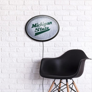 Michigan State Spartans: Hockey - Oval Slimline Lighted Wall Sign - The Fan-Brand