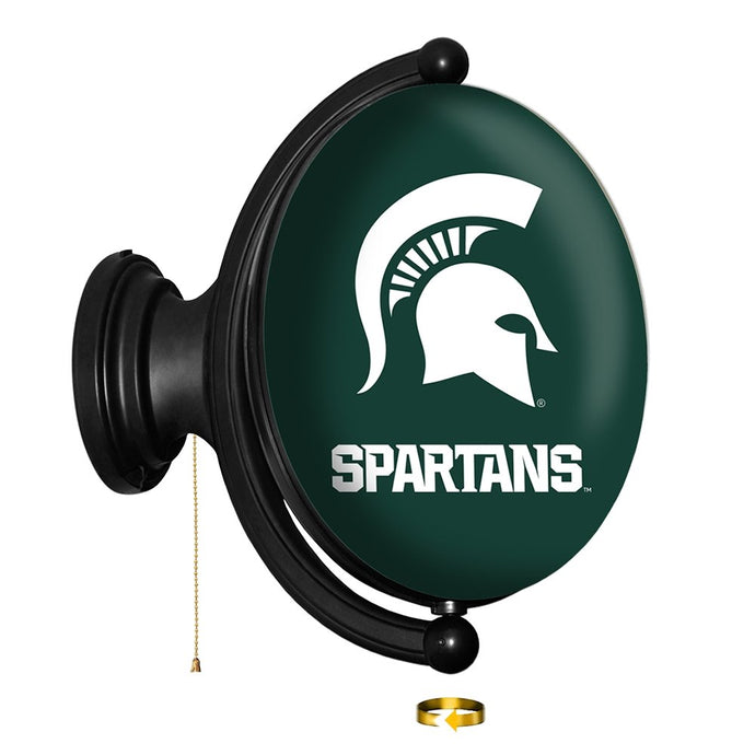 Michigan State Spartans: Original Oval Rotating Lighted Wall Sign - The Fan-Brand