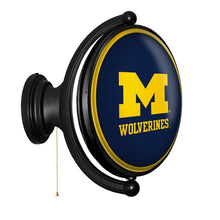 Load image into Gallery viewer, Michigan Wolverines: Maize - Original Oval Rotating Lighted Wall Sign - The Fan-Brand