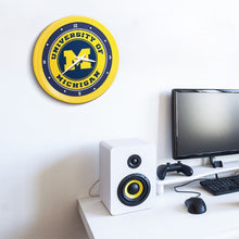 Load image into Gallery viewer, Michigan Wolverines: Ribbed Frame Wall Clock - The Fan-Brand