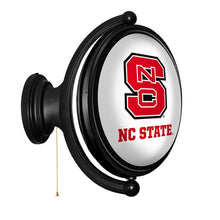 Load image into Gallery viewer, NC State Wolfpack: Original Oval Rotating Lighted Wall Sign - The Fan-Brand