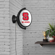 Load image into Gallery viewer, NC State Wolfpack: Original Oval Rotating Lighted Wall Sign - The Fan-Brand