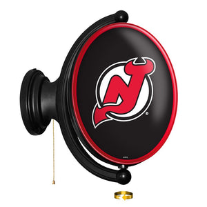 New Jersey Devils: Original Oval Rotating Lighted Wall Sign - The Fan-Brand