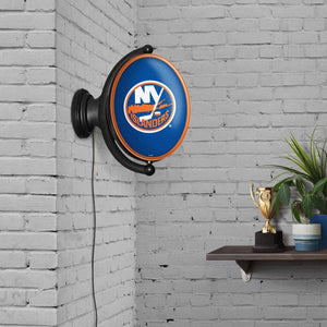 New York Islanders: Original Oval Rotating Lighted Wall Sign - The Fan-Brand