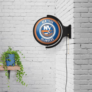 New York Islanders: Original Round Rotating Lighted Wall Sign - The Fan-Brand