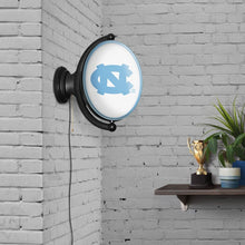 Load image into Gallery viewer, North Carolina Tar Heels: Original Oval Rotating Lighted Wall Sign - The Fan-Brand