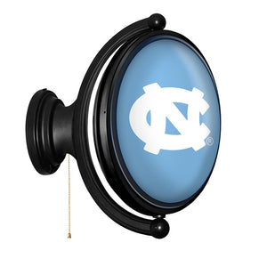 North Carolina Tar Heels: Original Oval Rotating Lighted Wall Sign - The Fan-Brand