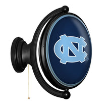 Load image into Gallery viewer, North Carolina Tar Heels: Original Oval Rotating Lighted Wall Sign - The Fan-Brand