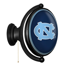 North Carolina Tar Heels: Original Oval Rotating Lighted Wall Sign - The Fan-Brand