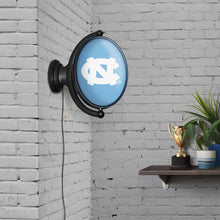 Load image into Gallery viewer, North Carolina Tar Heels: Original Oval Rotating Lighted Wall Sign - The Fan-Brand