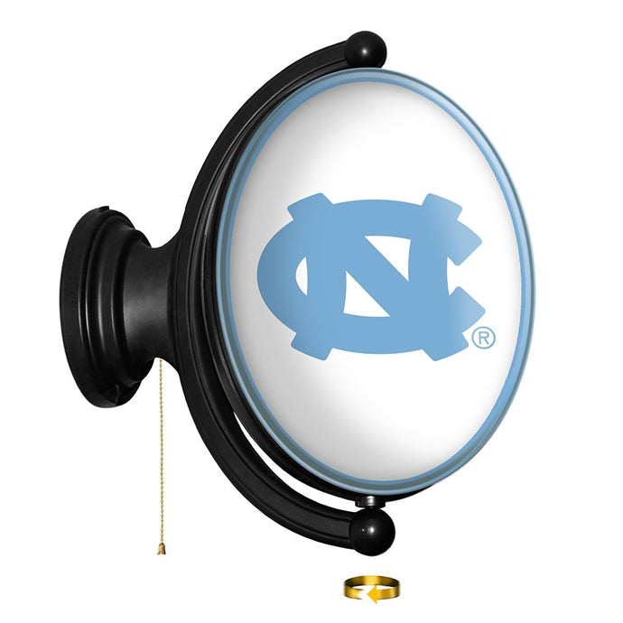 North Carolina Tar Heels: Original Oval Rotating Lighted Wall Sign - The Fan-Brand