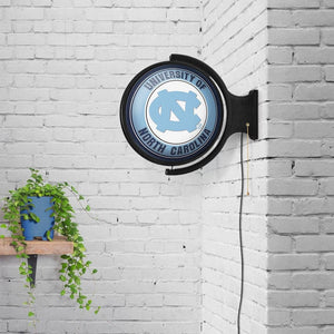 North Carolina Tar Heels: Original Round Rotating Lighted Wall Sign - The Fan-Brand