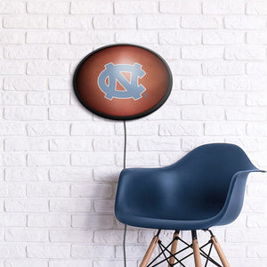 North Carolina Tar Heels: Pigskin - Oval Slimline Lighted Wall Sign - The Fan-Brand