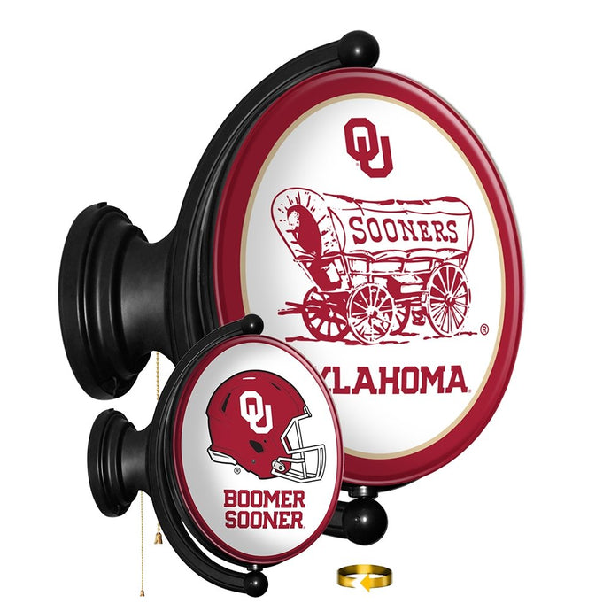 Oklahoma Sooners: Double Sided Original Oval Rotating Lighted Wall Sign - The Fan-Brand