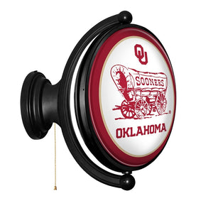 Oklahoma Sooners: Double Sided Original Oval Rotating Lighted Wall Sign - The Fan-Brand