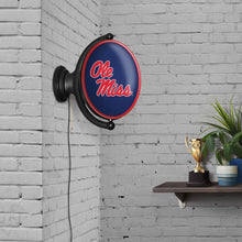 Load image into Gallery viewer, Ole Miss Rebels: Original Oval Rotating Lighted Wall Sign - The Fan-Brand