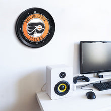 Load image into Gallery viewer, Philadelphia Flyers: Ribbed Frame Wall Clock - The Fan-Brand