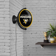 Load image into Gallery viewer, Pittsburgh Penguins: Original Oval Rotating Lighted Wall Sign - The Fan-Brand