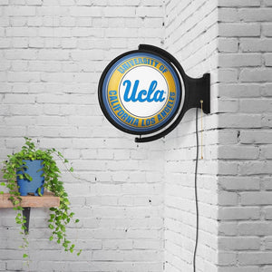 UCLA Bruins: Original Round Rotating Lighted Wall Sign - The Fan-Brand