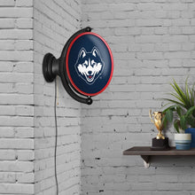 Load image into Gallery viewer, UConn Huskies: Original Oval Rotating Lighted Wall Sign - The Fan-Brand