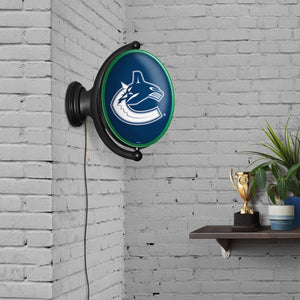 Vancouver Canucks: Original Oval Rotating Lighted Wall Sign - The Fan-Brand