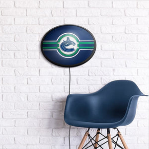 Vancouver Canucks: Oval Slimline Lighted Wall Sign - The Fan-Brand