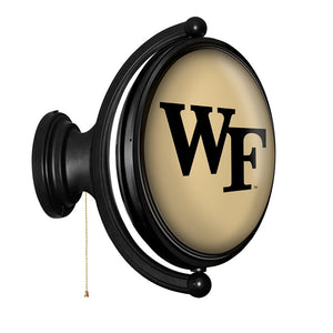 Wake Forest Demon Deacons: Original Oval Rotating Lighted Wall Sign - The Fan-Brand