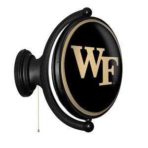 Wake Forest Demon Deacons: Original Oval Rotating Lighted Wall Sign - The Fan-Brand